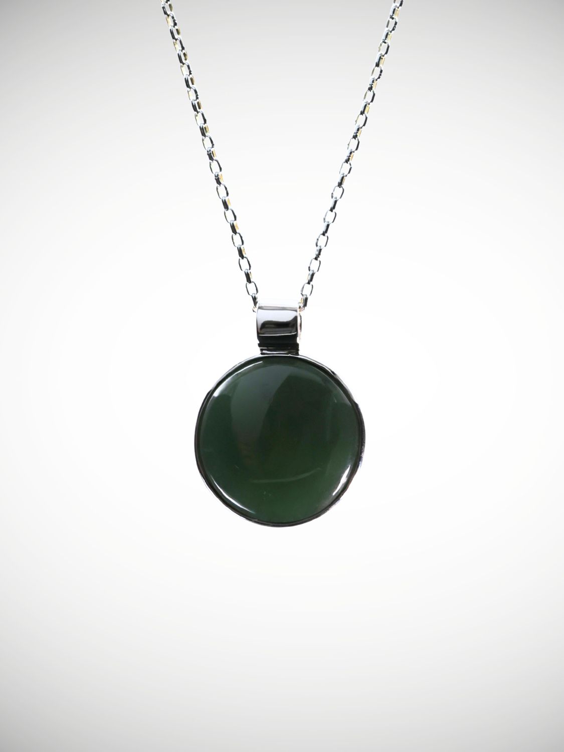 Moko Pounamu Genuine NZ Kawakawa Greenstone & Sterling Silver Disc Pendant - Pukerangi