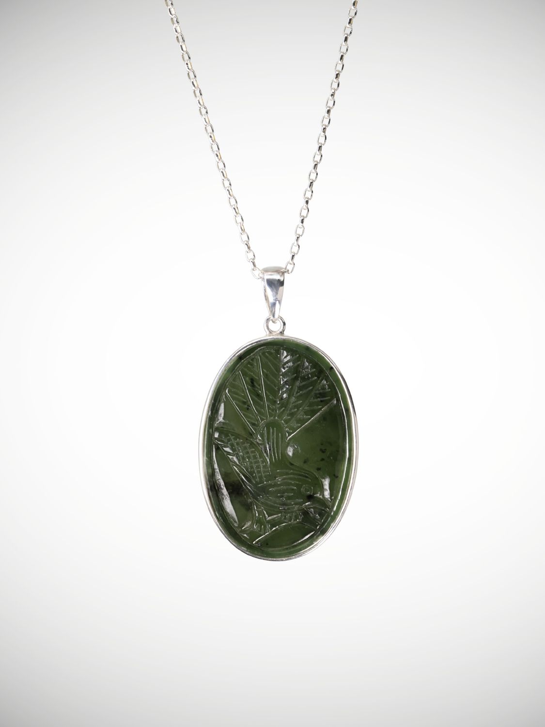 Moko Pounamu Genuine NZ Kawakawa Greenstone & Sterling Silver Fantail Pendant - Motutawa