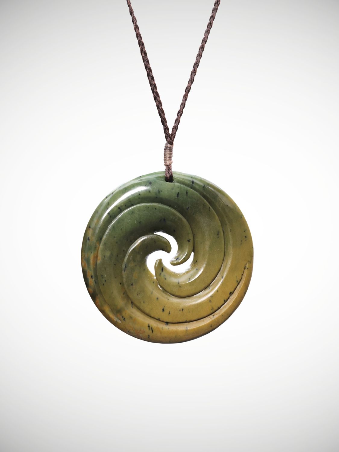 Moko Pounamu Triple Koru Genuine NZ Raukaraka Greenstone - Mangatina