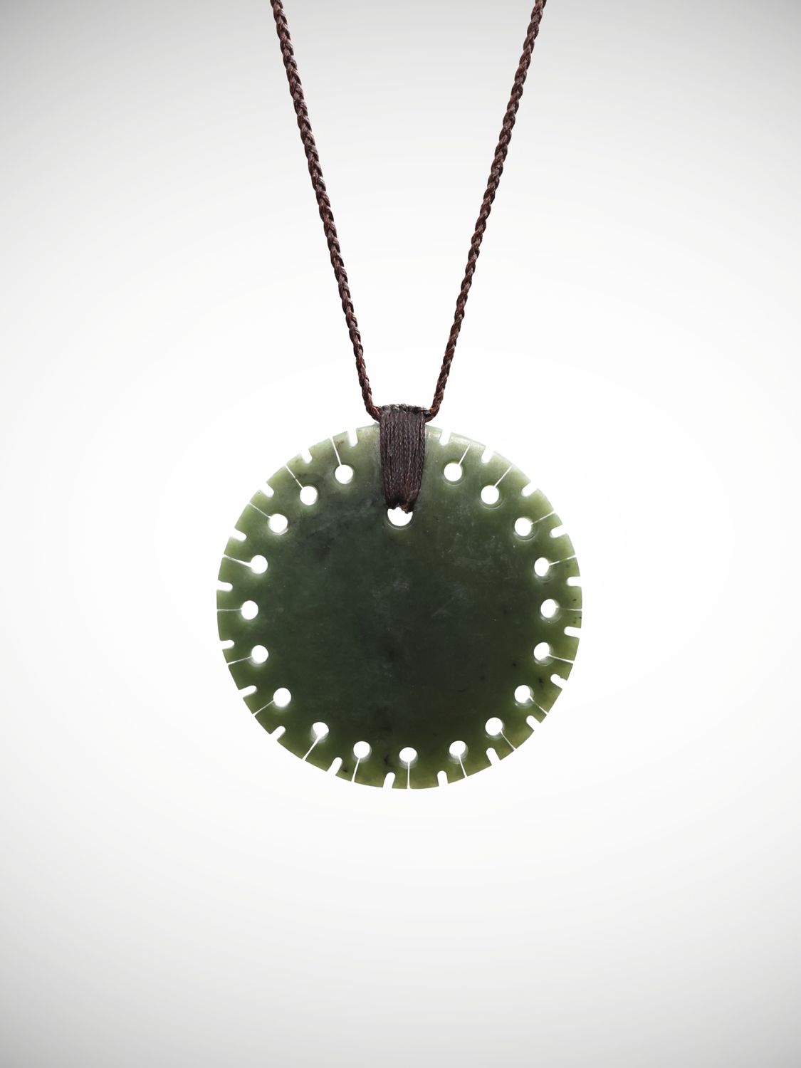 Moko Pounamu Notched Porohita (Disc) Genuine NZ Kawakawa Greenstone - Mangapu Moko Pounamu Notched Porohita (Disc) Genuine NZ Kawakawa Greenstone - Mangapu