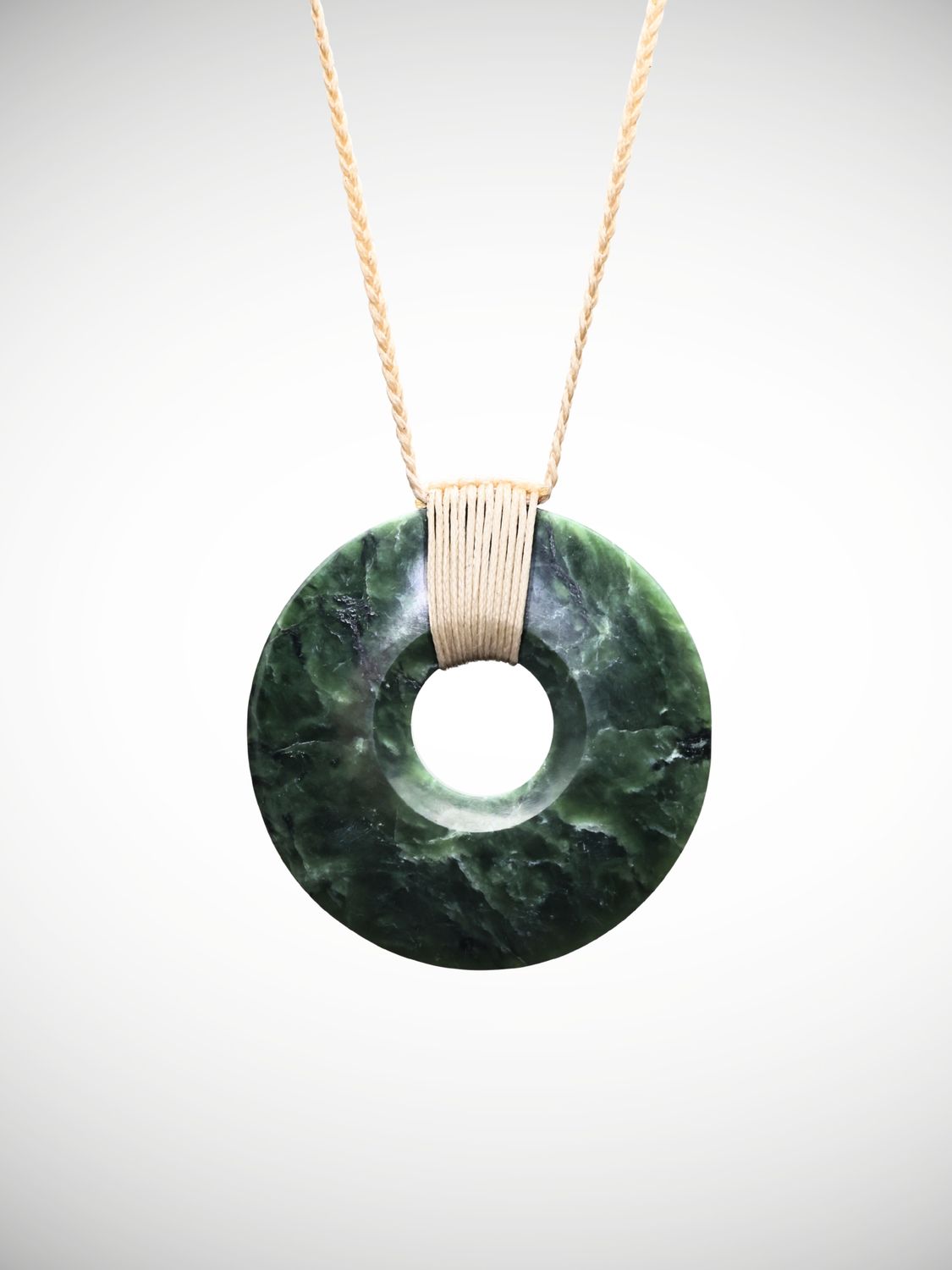 Moko Pounamu Porohita (Disc) Genuine NZ Kawakawa Greenstone - Mangarapa Moko Pounamu Porohita (Disc) Genuine NZ Kawakawa Greenstone - Mangarapa