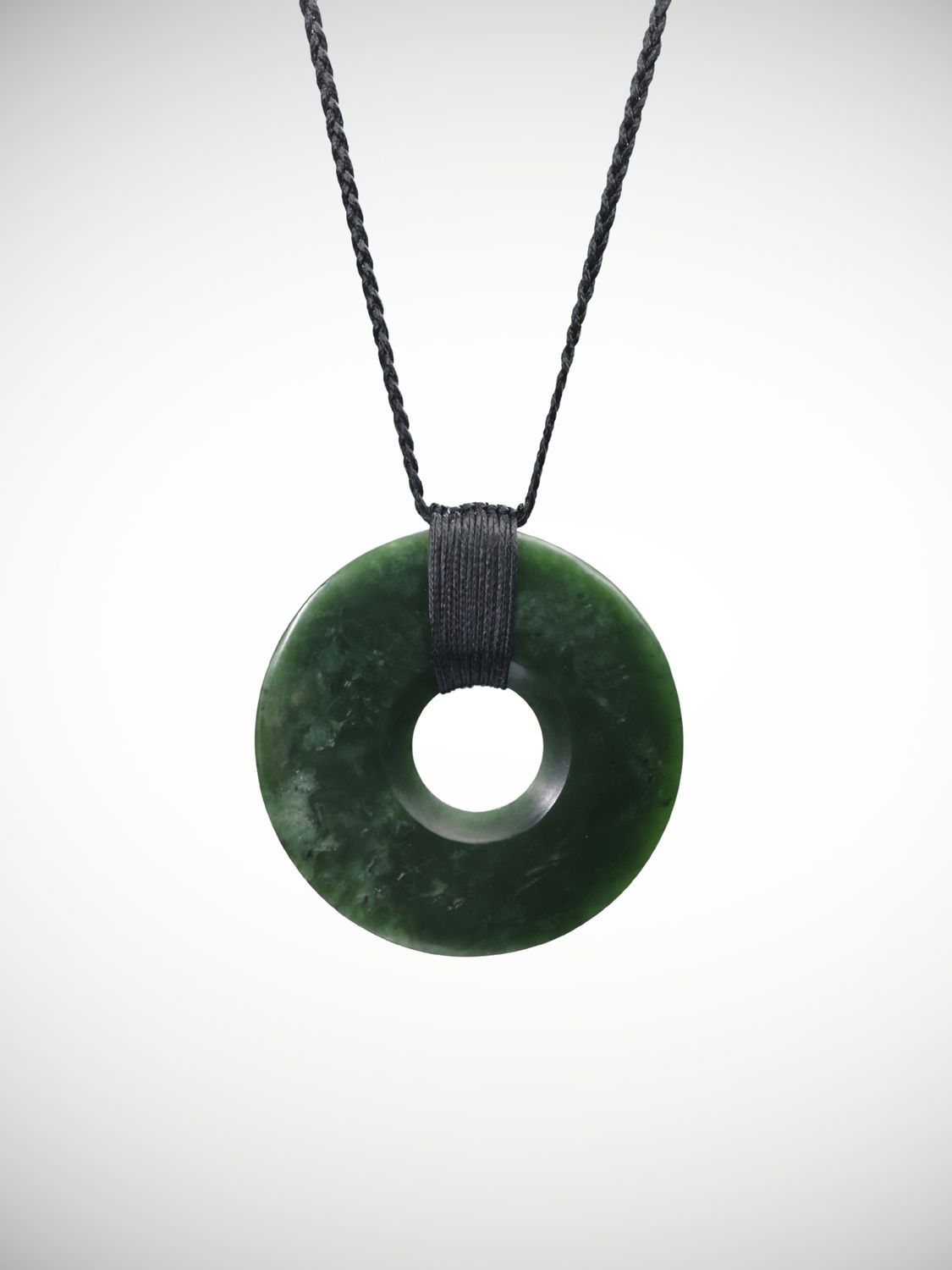 Moko Pounamu Porohita (Disc) Genuine NZ Kawakawa Greenstone - Kainamu Moko Pounamu Porohita (Disc) Genuine NZ Kawakawa Greenstone - Kainamu