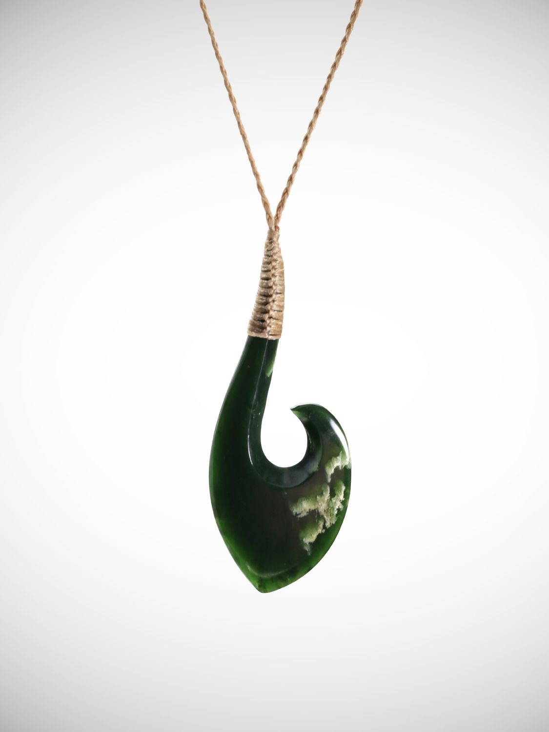 Moko Pounamu Hei Matau (Hook) Genuine NZ Kawakawa Flower Greenstone - Pukepoto Moko Pounamu Hei Matau (Hook) Genuine NZ Kawakawa Flower Greenstone - Pukepoto