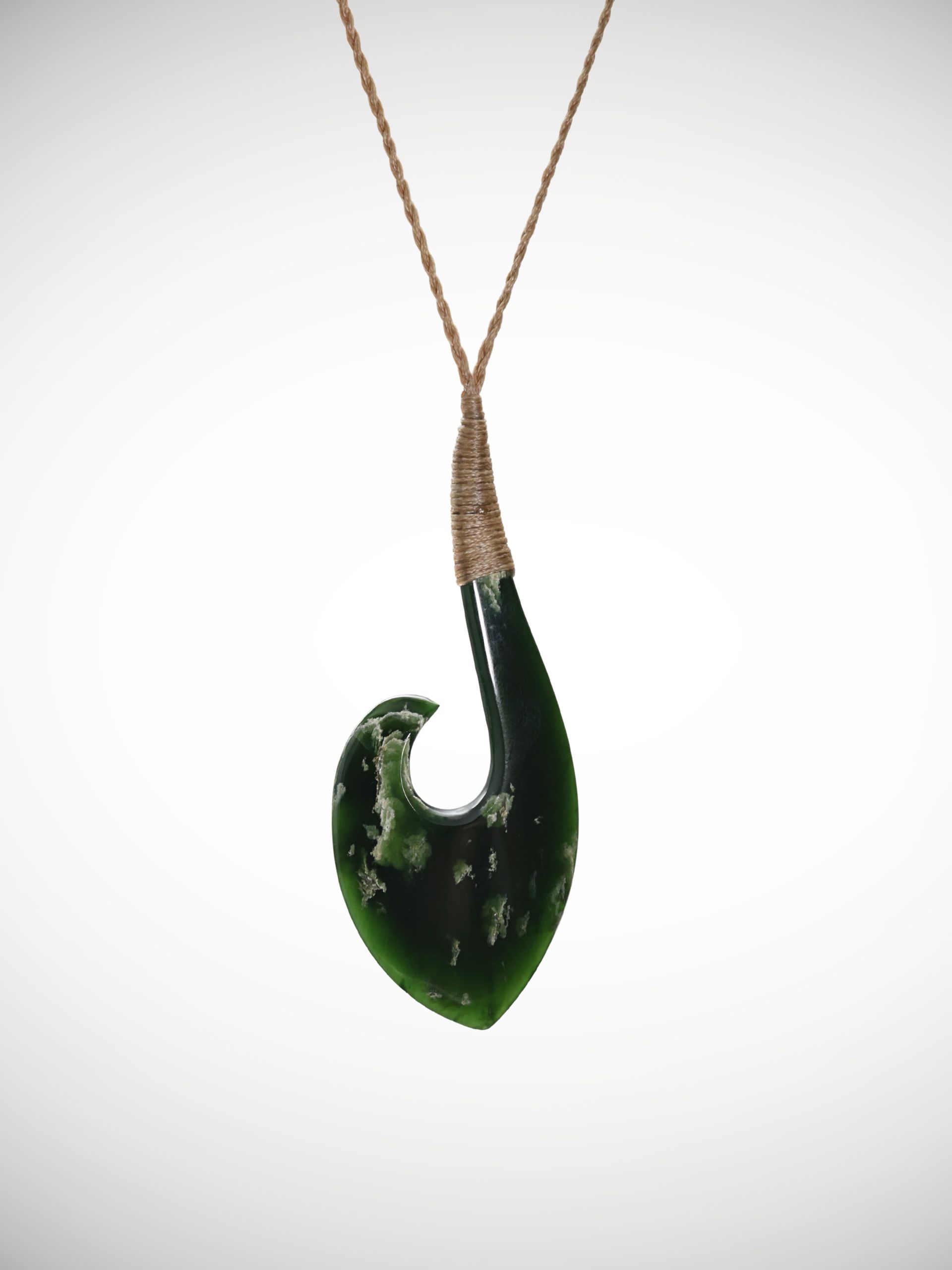 Moko Pounamu Hei Matau (Hook) Genuine NZ Kawakawa Flower Greenstone - Pukepoto