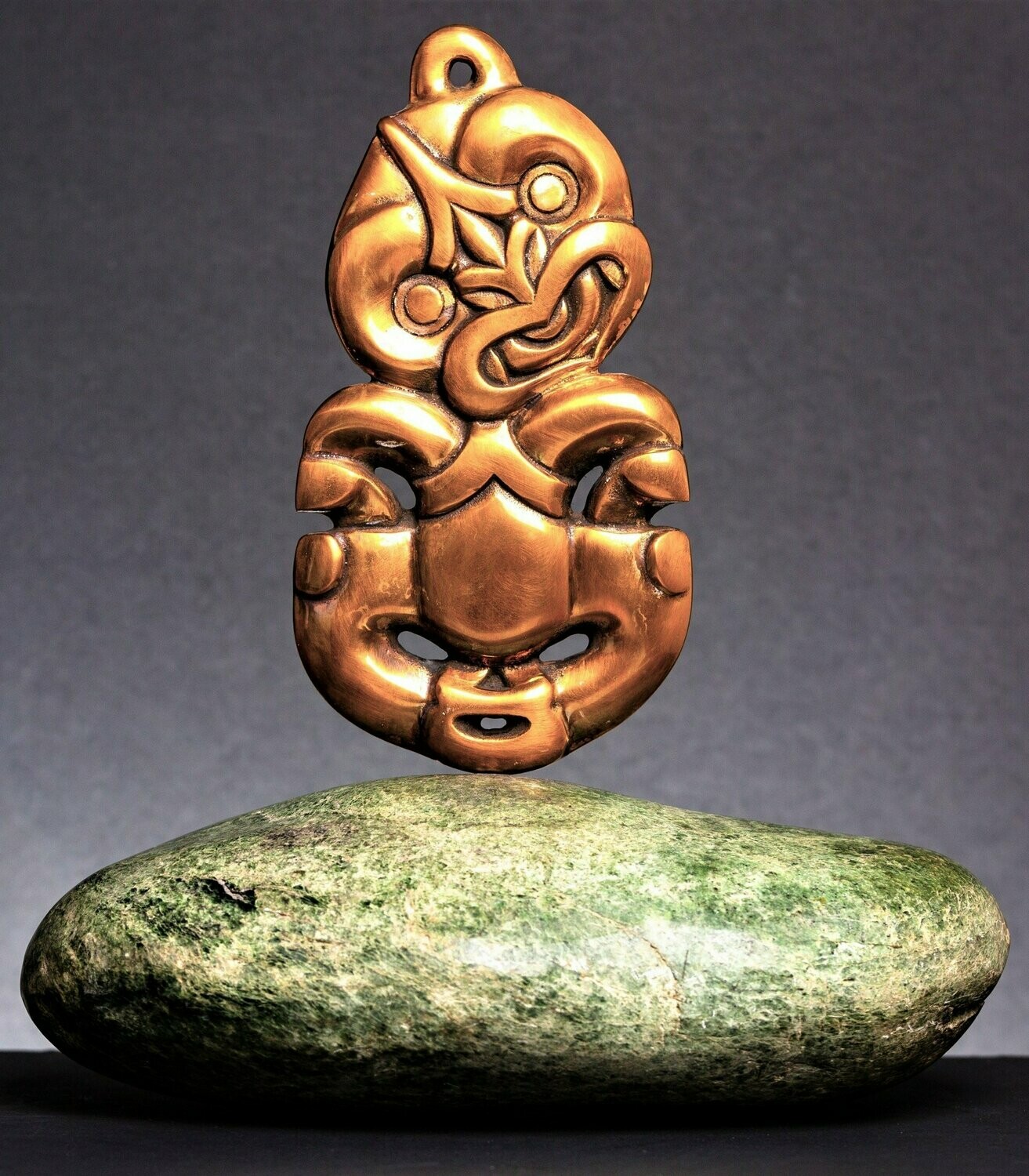 Moko Pounamu Tiki Bronze Sculpture on Genuine Auhunga Greenstone - Iwitahi Moko Pounamu Tiki Bronze Sculpture on Genuine Auhunga Greenstone - Iwitahi