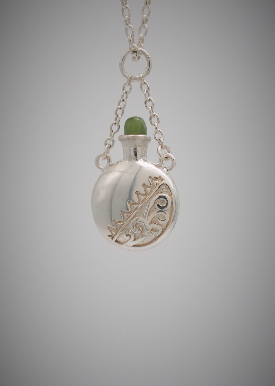 Moko Pounamu Perfume Bottle Greenstone and Sterling Silver Designer Pendant Sml - SB4S - SALE Moko Pounamu Perfume Bottle Greenstone and Sterling Silver Designer Pendant Sml - SB4S - SALE