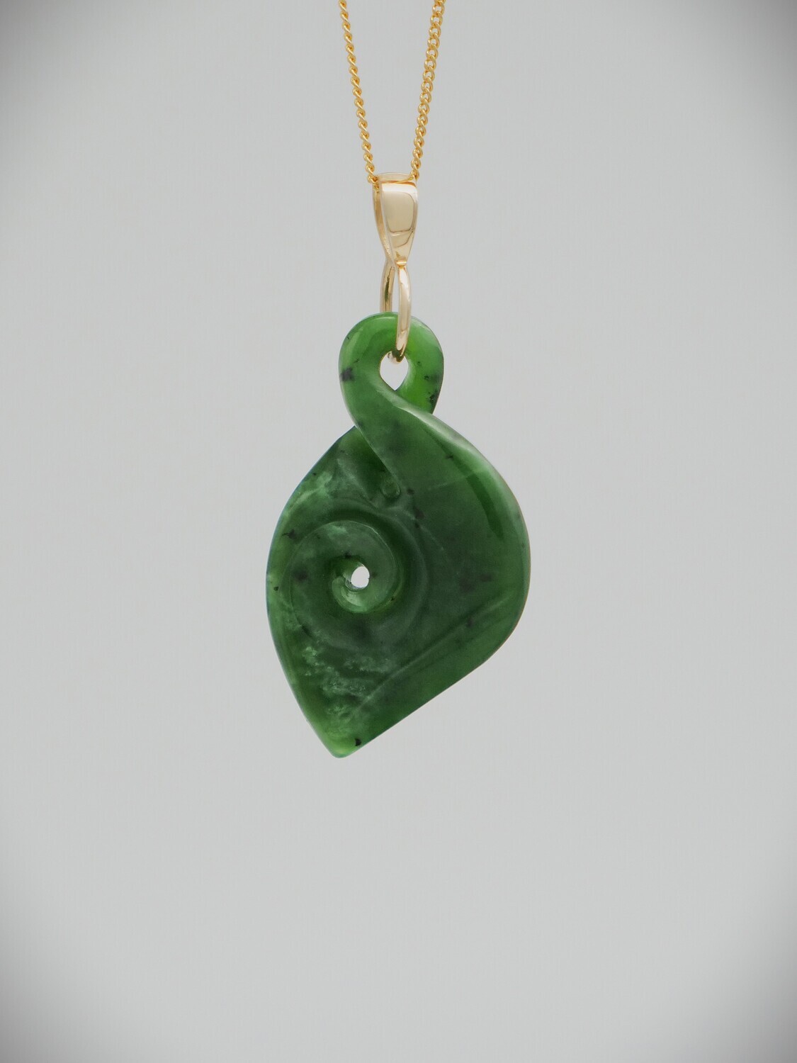 Moko Pounamu Double Pikorua (Twist) NZ Genuine Kawakawa Flower Greenstone & 9ct gold - Te Hoiere Moko Pounamu Double Pikorua (Twist) NZ Genuine Kawakawa Flower Greenstone & 9ct gold - Te Hoiere