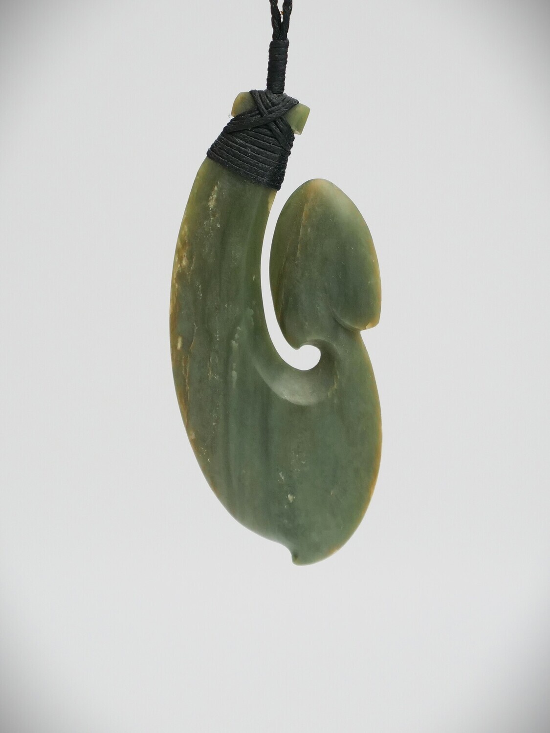 Moko Pounamu Hei Matau (Hook) NZ Genuine Inanga Greenstone - Tengawai Moko Pounamu Hei Matau (Hook) NZ Genuine Inanga Greenstone - Tengawai