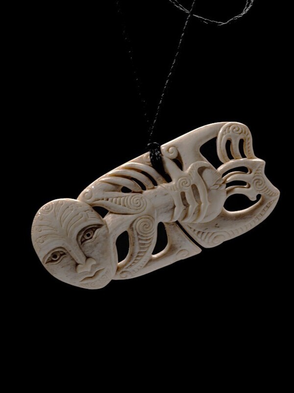 Moko Pounamu Hei Tiki Genuine Whale Bone Carving - Hinemoa Moko Pounamu Hei Tiki Genuine Whale Bone Carving - Hinemoa