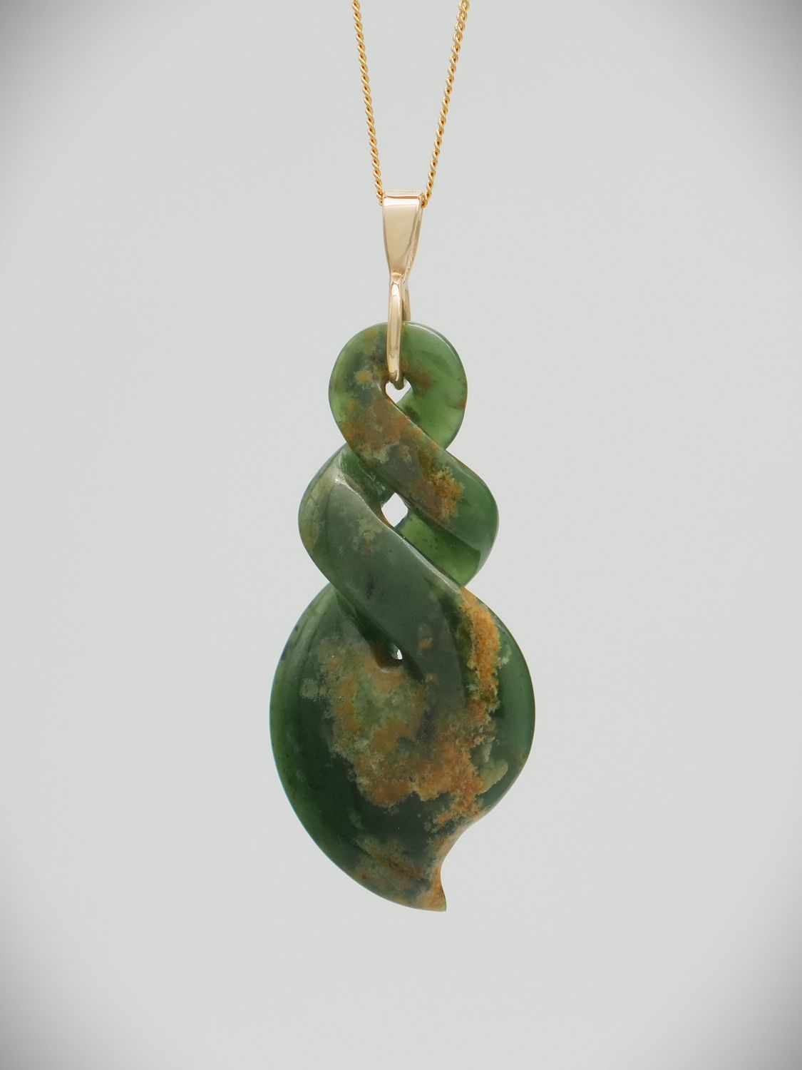 Moko Pounamu Double Pikorua NZ Genuine Marsden Flower Greenstone & 9ct Gold Bail - Wairepo Moko Pounamu Double Pikorua NZ Genuine Marsden Flower Greenstone & 9ct Gold Bail - Wairepo