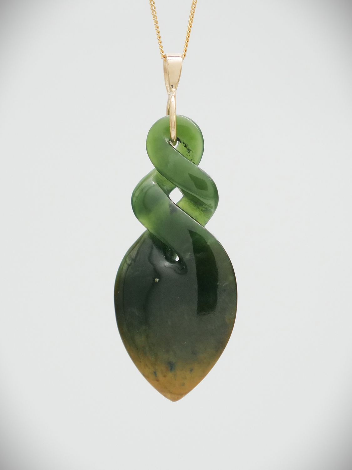 Moko Pounamu Double Pikorua NZ Genuine Marsden Flower Greenstone & 9ct Gold Bail - Ohau Moko Pounamu Double Pikorua NZ Genuine Marsden Flower Greenstone & 9ct Gold Bail - Ohau