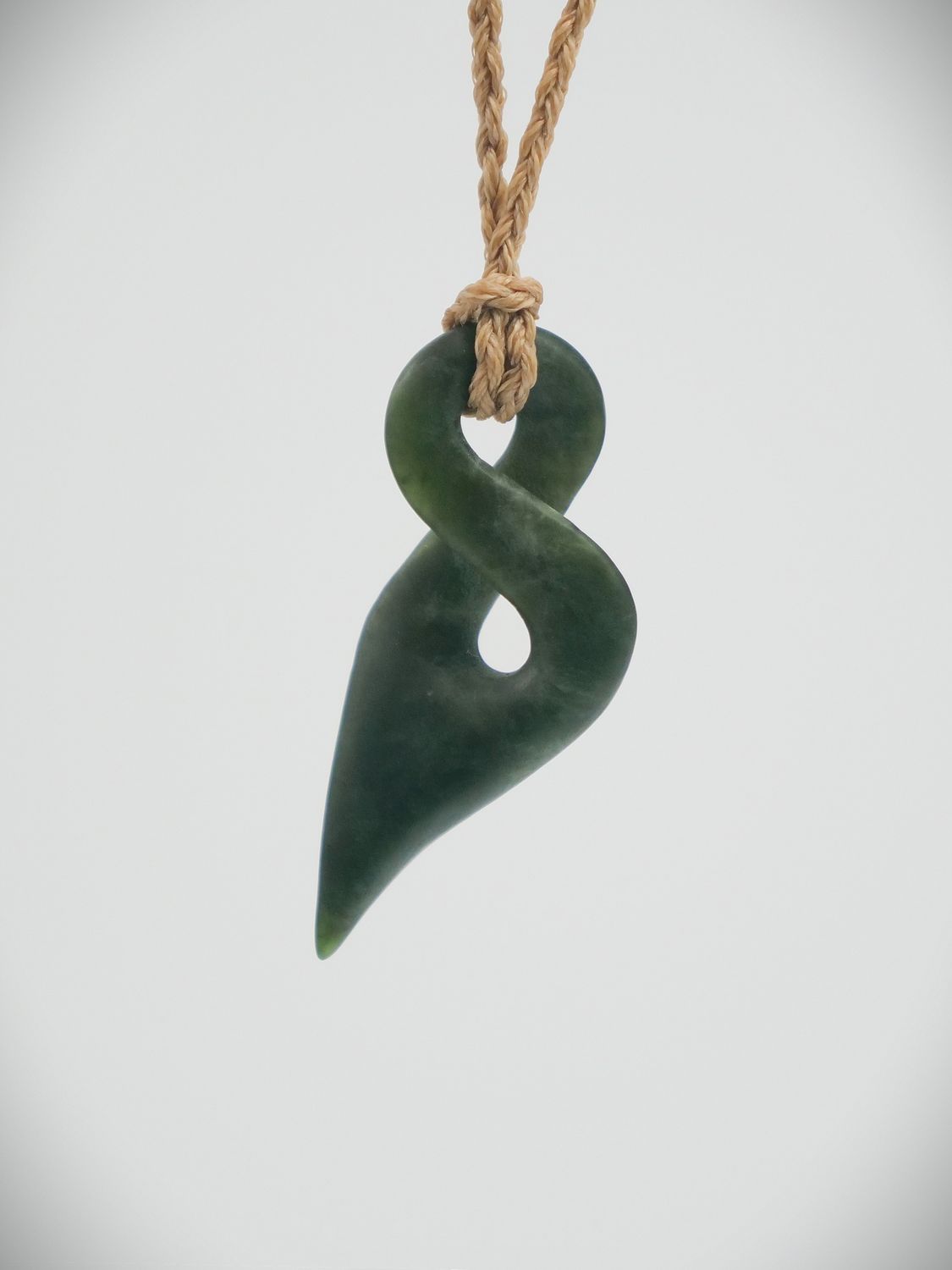 Moko Pounamu Contemporary single Pikorua NZ Genuine Kawakawa Greenstone - Awamoa Moko Pounamu Contemporary single Pikorua NZ Genuine Kawakawa Greenstone - Awamoa