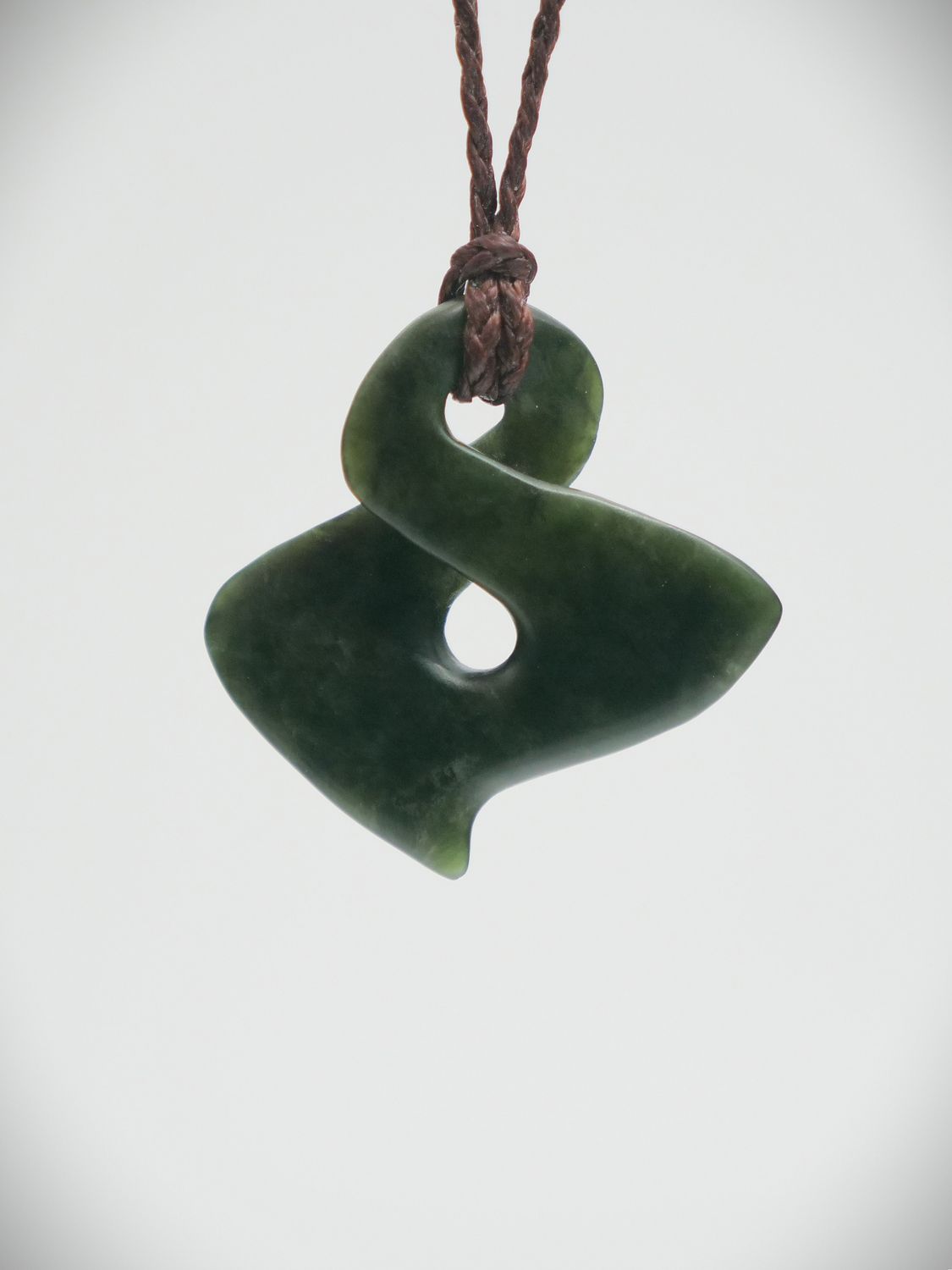Moko Pounamu Contemporary Single Pikorua NZ Genuine Kawakawa Greenstone - Otipua Moko Pounamu Contemporary Single Pikorua NZ Genuine Kawakawa Greenstone - Otipua