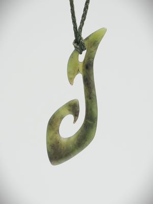 Moko Pounamu Hei Matau (Hook) NZ Genuine Totoweka Greenstone - Konini Moko Pounamu Hei Matau (Hook) NZ Genuine Totoweka Greenstone - Konini