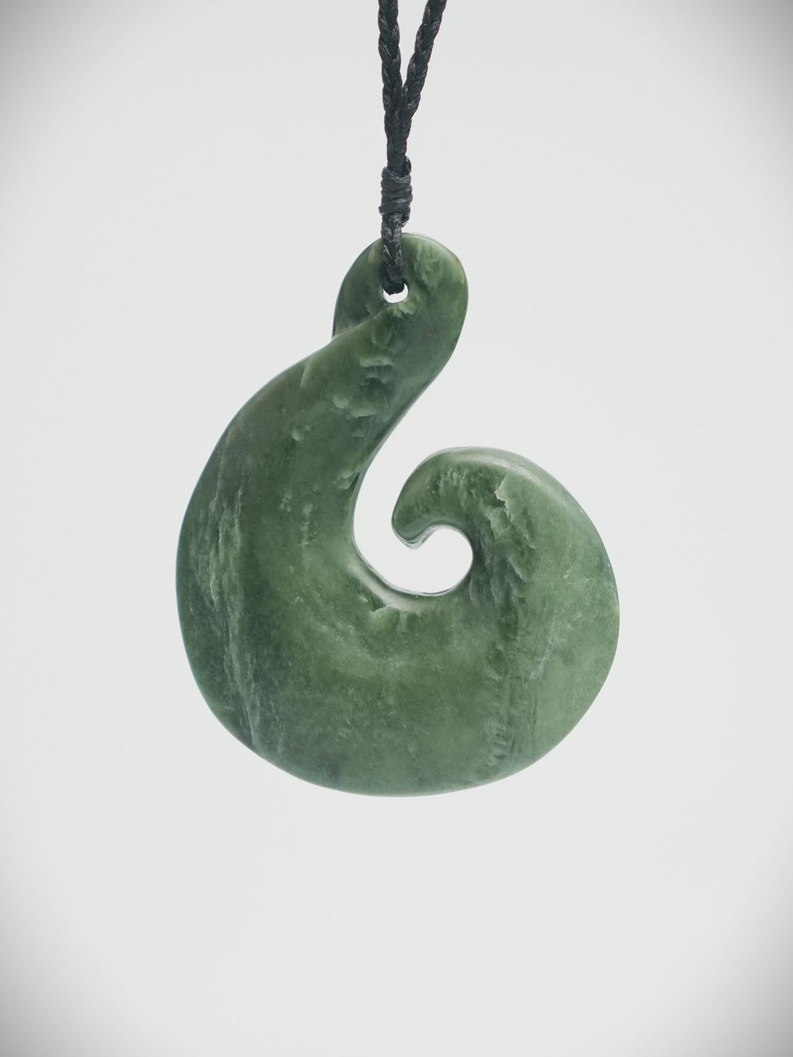 Moko Pounamu Hei Matau (Hook) NZ Genuine Kawakawa Greenstone - Wakanui Moko Pounamu Hei Matau (Hook) NZ Genuine Kawakawa Greenstone - Wakanui