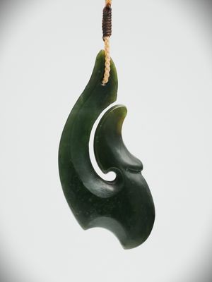 Moko Pounamu Hei Matau (Hook) NZ Genuine Kawakawa Greenstone - Turo Moko Pounamu Hei Matau (Hook) NZ Genuine Kawakawa Greenstone - Turo