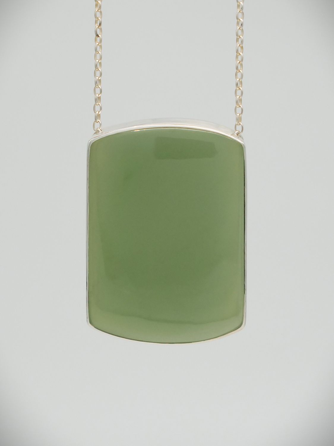 Moko Pounamu Gilt Jewellery Inanga Greenstone & Sterling Silver Pendant 12861 Moko Pounamu Gilt Jewellery Inanga Greenstone & Sterling Silver Pendant 12861