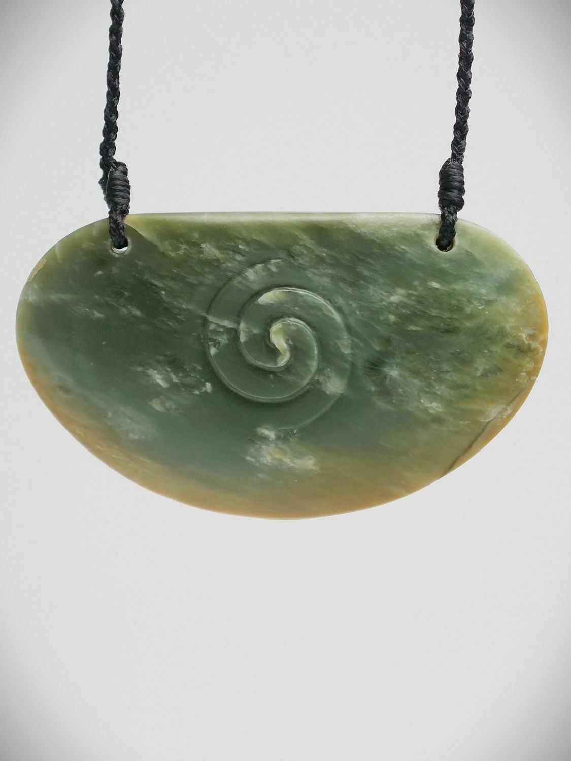 Moko Pounamu Kouma (Breastplate) with Koru NZ Genuine Inanga Flower Greenstone - Tiromaunga Moko Pounamu Kouma (Breastplate) with Koru NZ Genuine Inanga Flower Greenstone - Tiromaunga