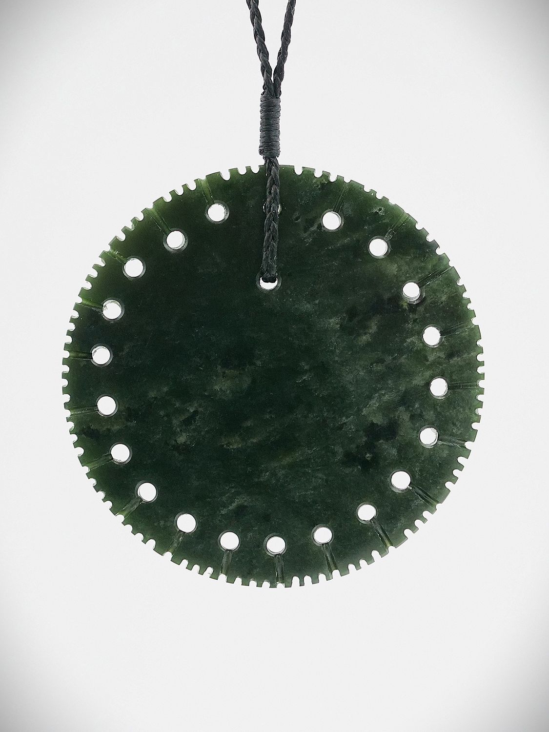 Moko Pounamu Notched Porohita (Disc) NZ Genuine Kawakawa Greenstone - Omapere Moko Pounamu Notched Porohita (Disc) NZ Genuine Kawakawa Greenstone - Omapere