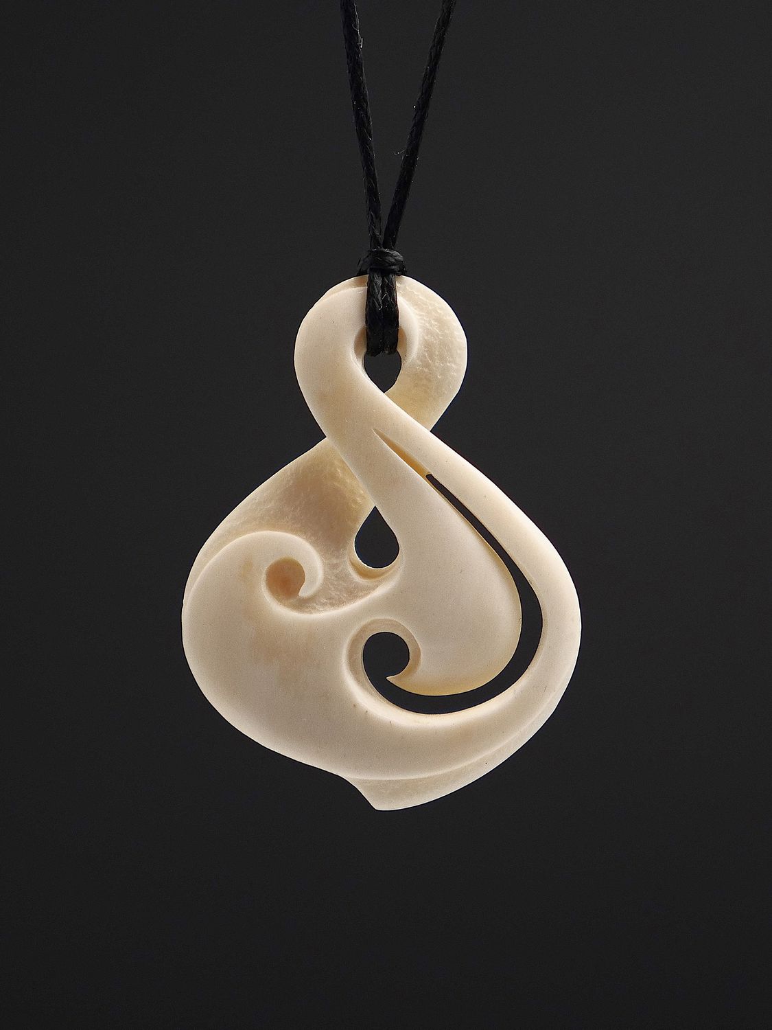 Moko Pounamu Pikorua (Twist) Bone Carving - Whio Moko Pounamu Pikorua (Twist) Bone Carving - Whio