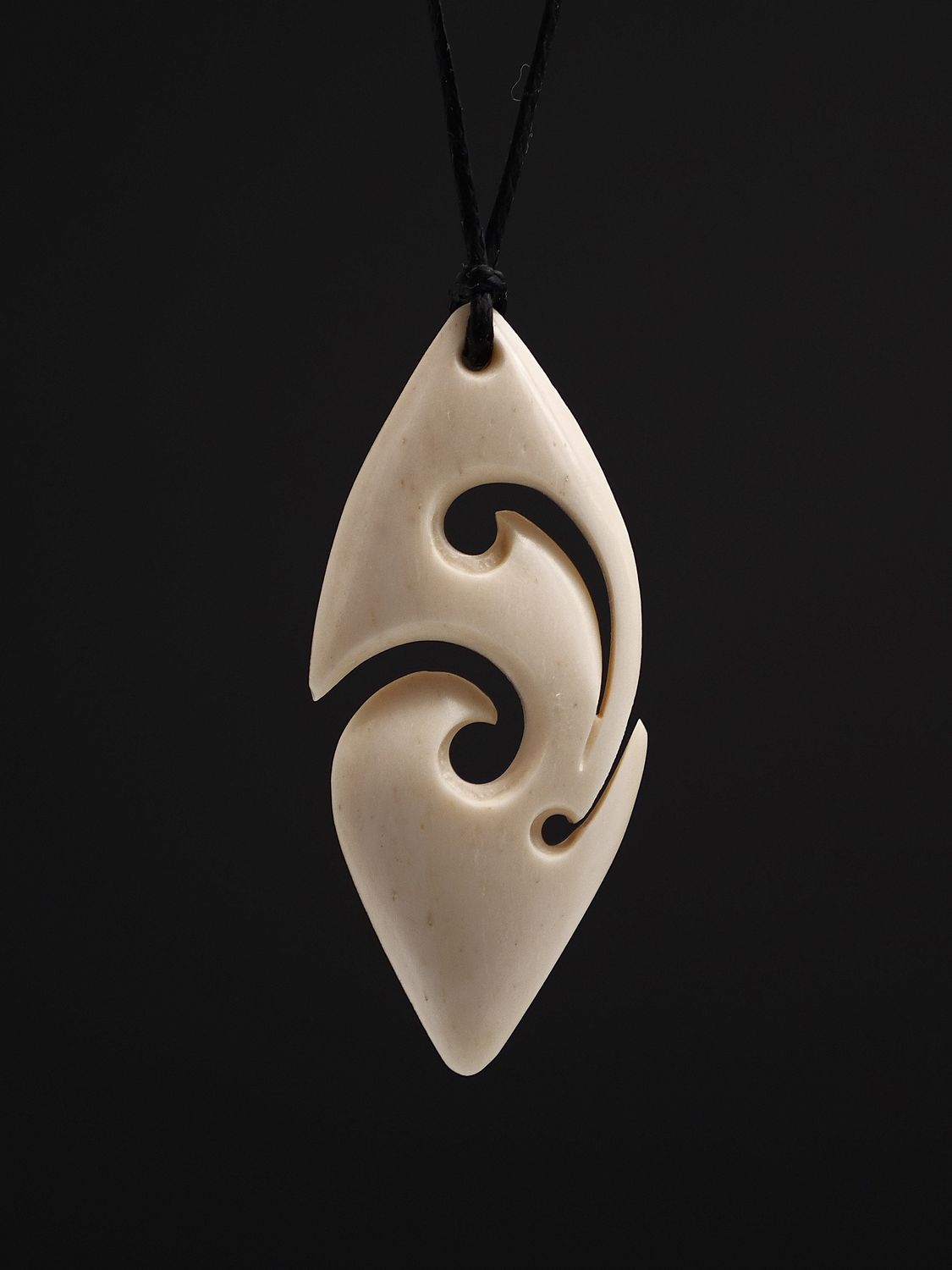 Moko Pounamu Koru Bone Carving - Peketa Moko Pounamu Koru Bone Carving - Peketa