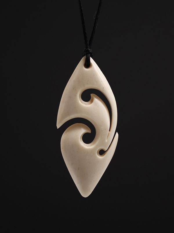 Moko Pounamu Koru Bone Carving - Peketa Moko Pounamu Koru Bone Carving - Peketa