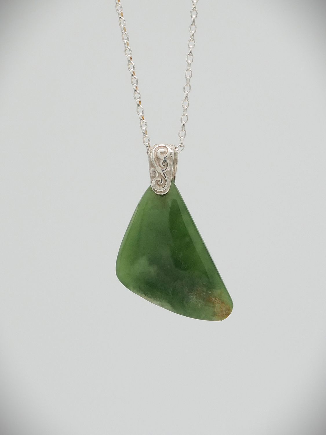Moko Pounamu Kuru (Drop) NZ Genuine Kahurangi Flower Greenstone & Sterling Silver - Te Mahia Moko Pounamu Kuru (Drop) NZ Genuine Kahurangi Flower Greenstone & Sterling Silver - Te Mahia