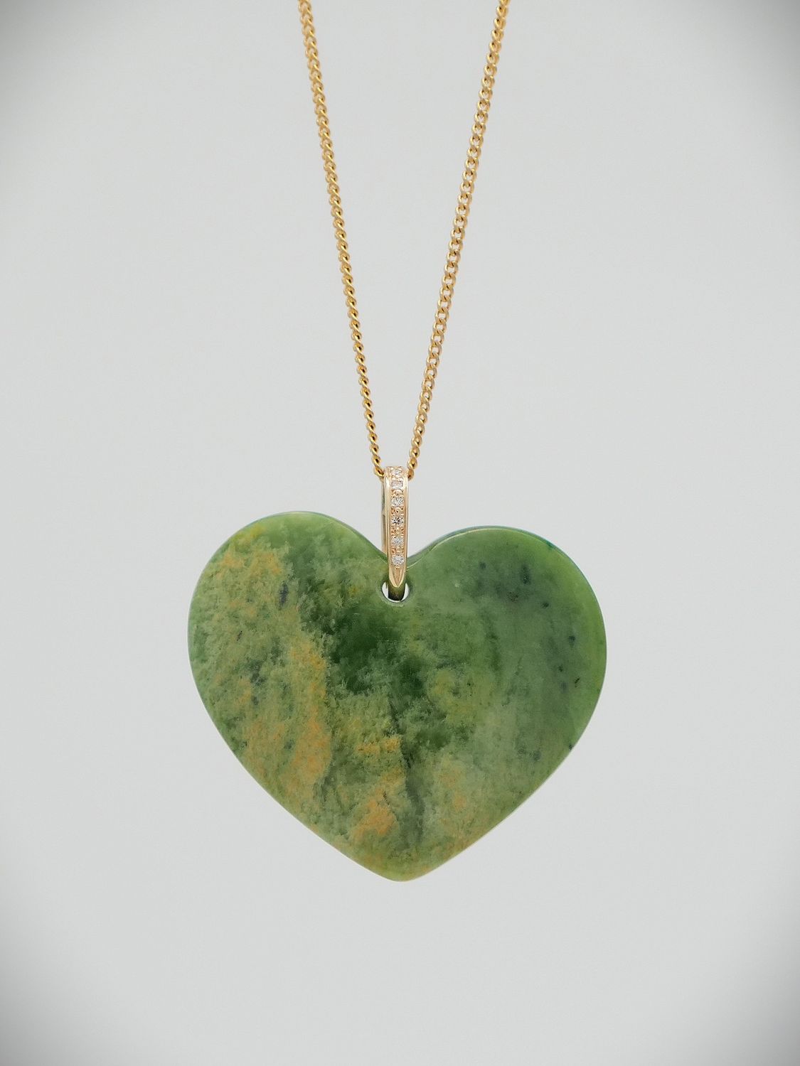 Moko Pounamu Manawa (Heart) NZ Genuine Kahurangi Flower Greenstone, 9ct Gold & Diamond Pendant - Ohariu Moko Pounamu Manawa (Heart) NZ Genuine Kahurangi Flower Greenstone, 9ct Gold & Diamond Pendant - Ohariu