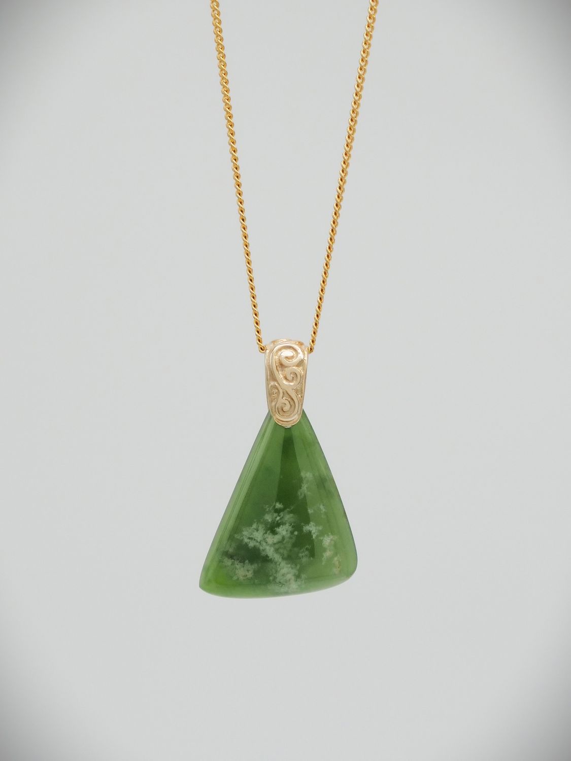 Moko Pounamu Kuru NZ Genuine Kahurangi Flower Greenstone, 9ct Gold Pendant - Oteranga Moko Pounamu Kuru NZ Genuine Kahurangi Flower Greenstone, 9ct Gold Pendant - Oteranga