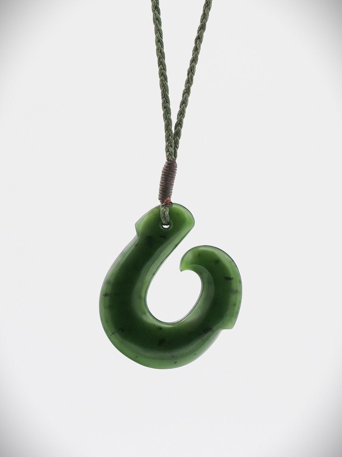 Moko Pounamu Hei Matau NZ Genuine Kawakawa Greenstone - Orongorongo Moko Pounamu Hei Matau NZ Genuine Kawakawa Greenstone - Orongorongo