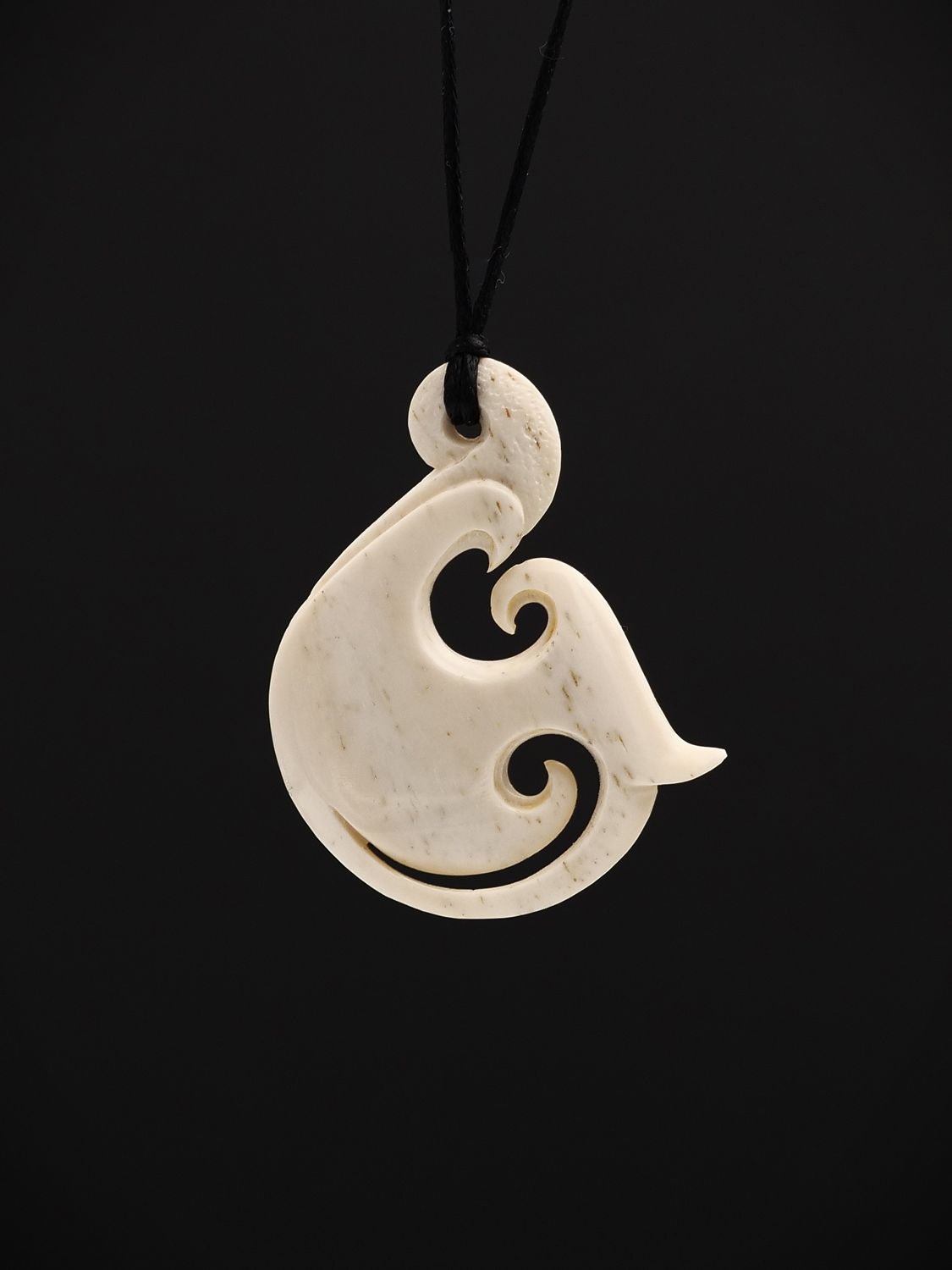 Moko Pounamu Hei Matau (Hook) Whale Bone Carving - Manukau Moko Pounamu Hei Matau (Hook) Whale Bone Carving - Manukau