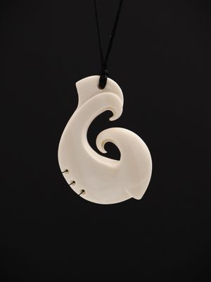 Moko Pounamu Hei Matau (Hook) Bone Carving - Puketawa Moko Pounamu Hei Matau (Hook) Bone Carving - Puketawa