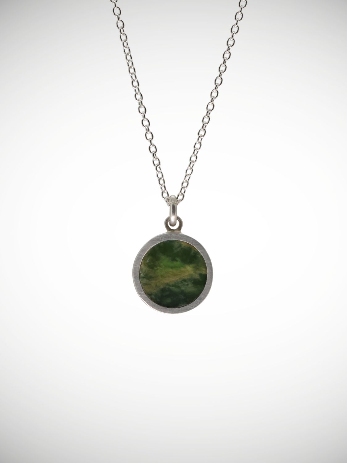 Moko Pounamu Genuine NZ Greenstone & Sterling Silver Round Pendant CP12-P