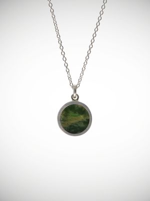 Moko Pounamu Genuine NZ Greenstone & Sterling Silver Round Pendant CP12-P Moko Pounamu Genuine NZ Greenstone & Sterling Silver Round Pendant CP12-P