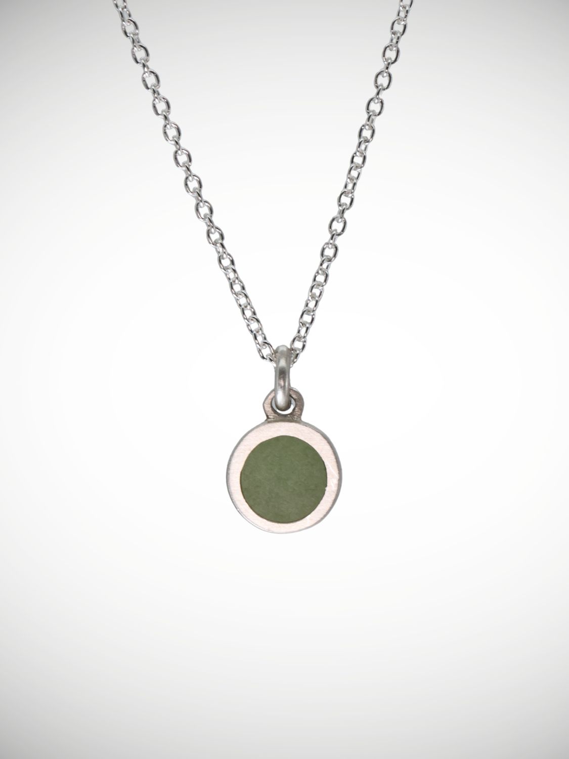 Moko Pounamu Genuine NZ Greenstone & Sterling Silver Small Round CAIM Pendant CP8-P