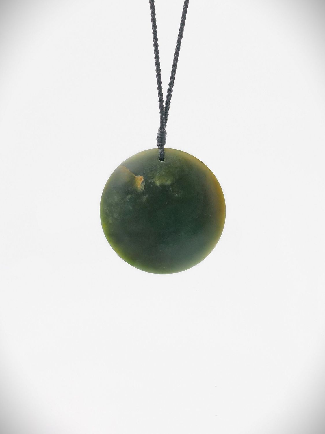Moko Pounamu Porohita Disc NZ Genuine Kawakawa Greenstone - Putorino