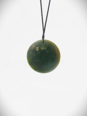 Moko Pounamu Porohita Disc NZ Genuine Kawakawa Greenstone - Putorino