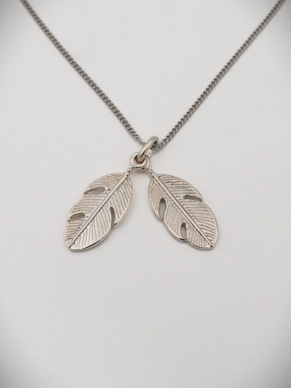 Moko Pounamu Sterling Silver Twin Feather Charm Necklace