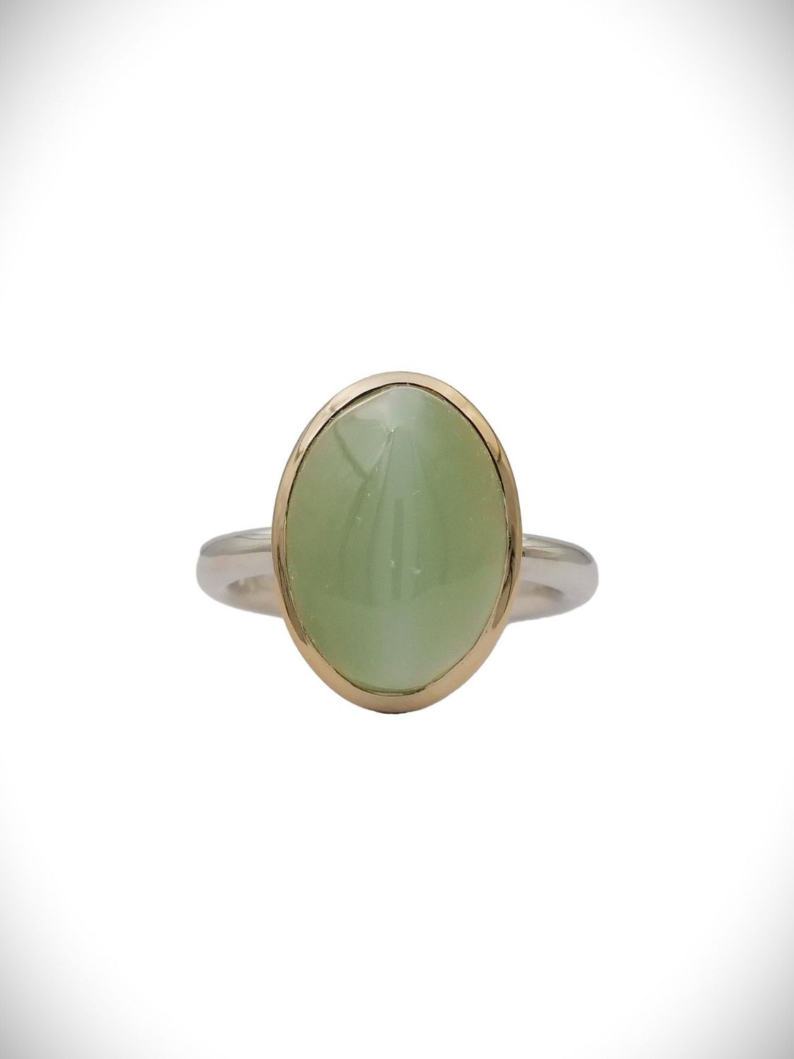 Moko Pounamu 9ct Gold and Stirling Silver Inanga Oval Ring Moko Pounamu 9ct Gold and Stirling Silver Inanga Oval Ring