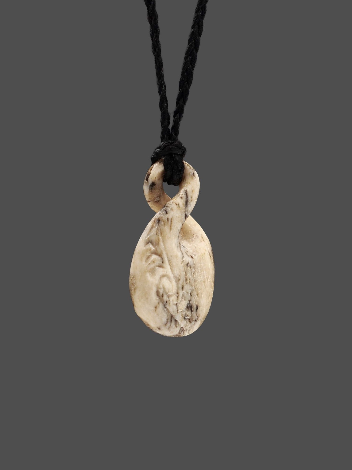 Moko Pounamu Pikorua Whale Bone Carving - Mangere