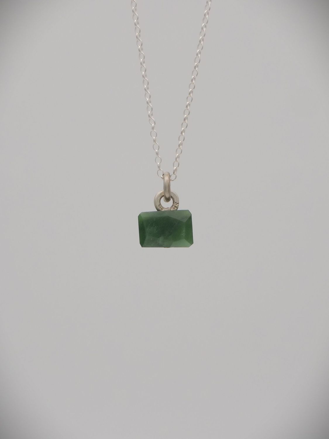 Moko Pounamu Genuine NZ Kahurangi Greenstone & Sterling Silver Faceted Rivet Rock Pendant - Taunoka