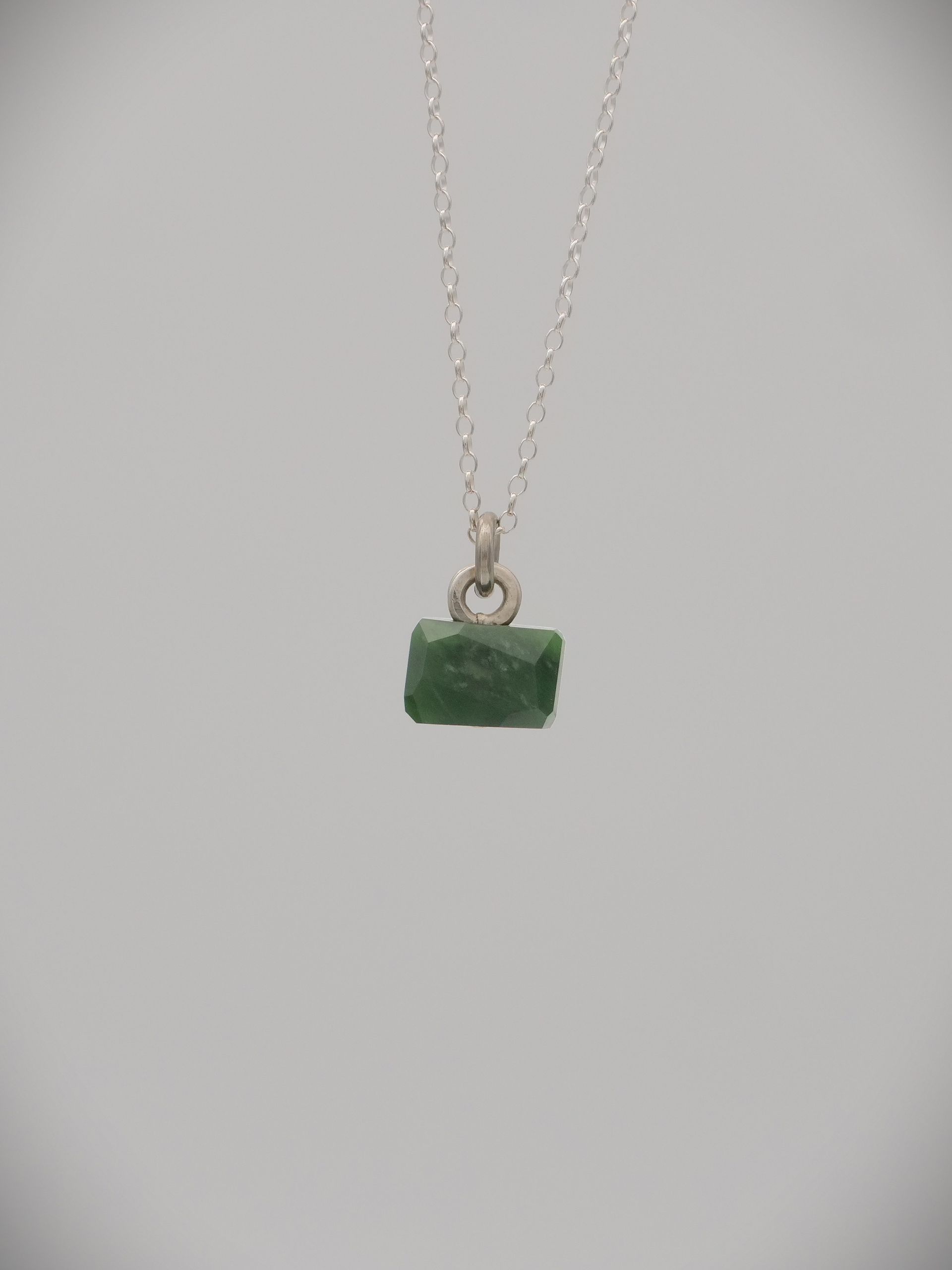 Moko Pounamu Genuine NZ Kahurangi Greenstone & Sterling Silver Faceted Rivet Rock Pendant - Taunoka
