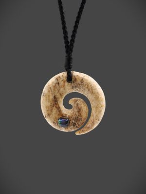 Moko Pounamu Koru Genuine Whale Bone Carving - Tekoa Moko Pounamu Koru Genuine Whale Bone Carving - Tekoa