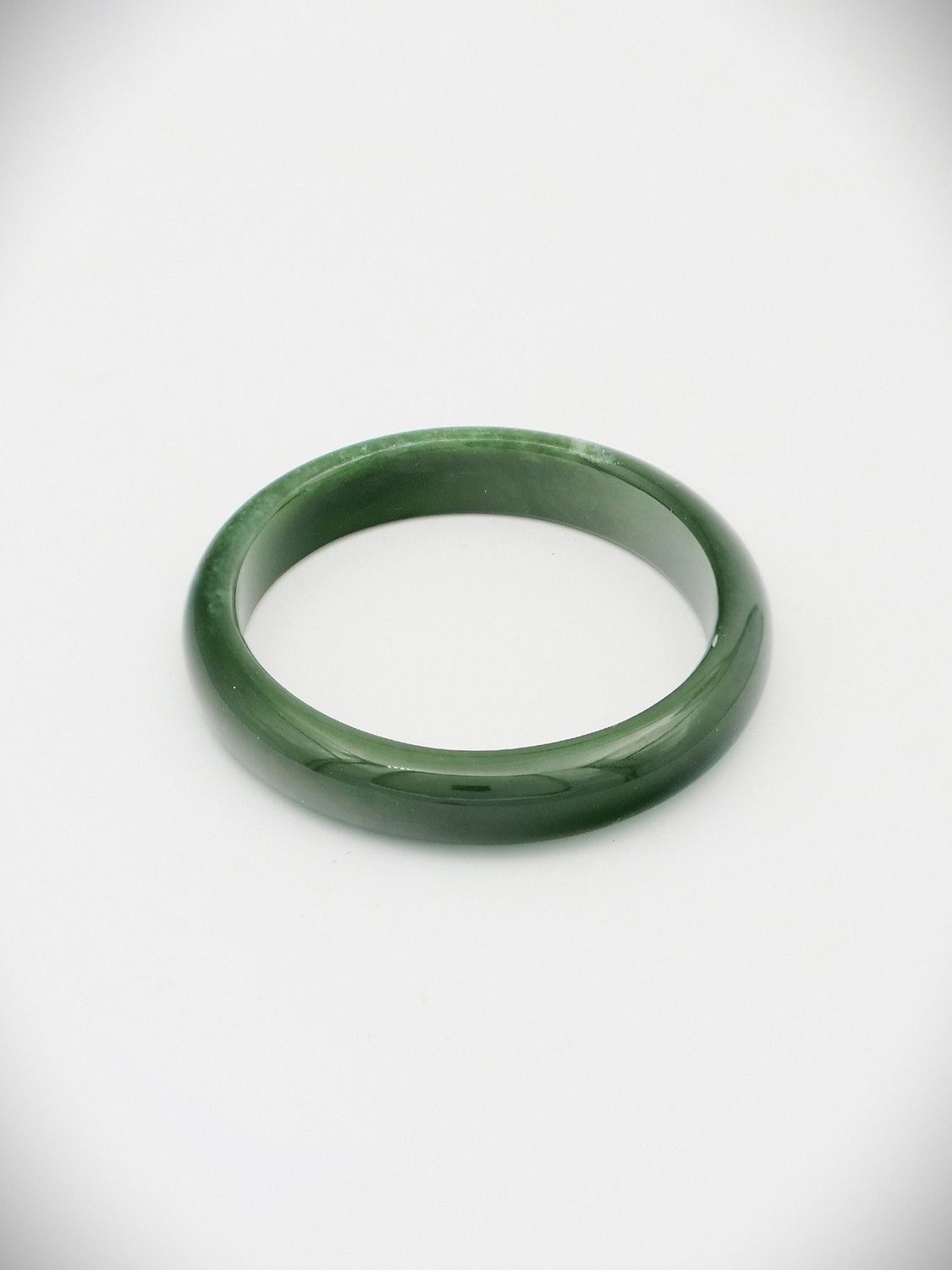 Moko Pounamu Solid Bangle NZ Genuine Kahurangi Greenstone - Wharehine  54mm
