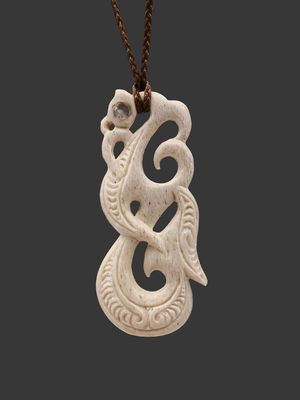 Moko Pounamu Manaia Genuine Whale Bone Carving - Te Umutaoroa Moko Pounamu Manaia Genuine Whale Bone Carving - Te Umutaoroa