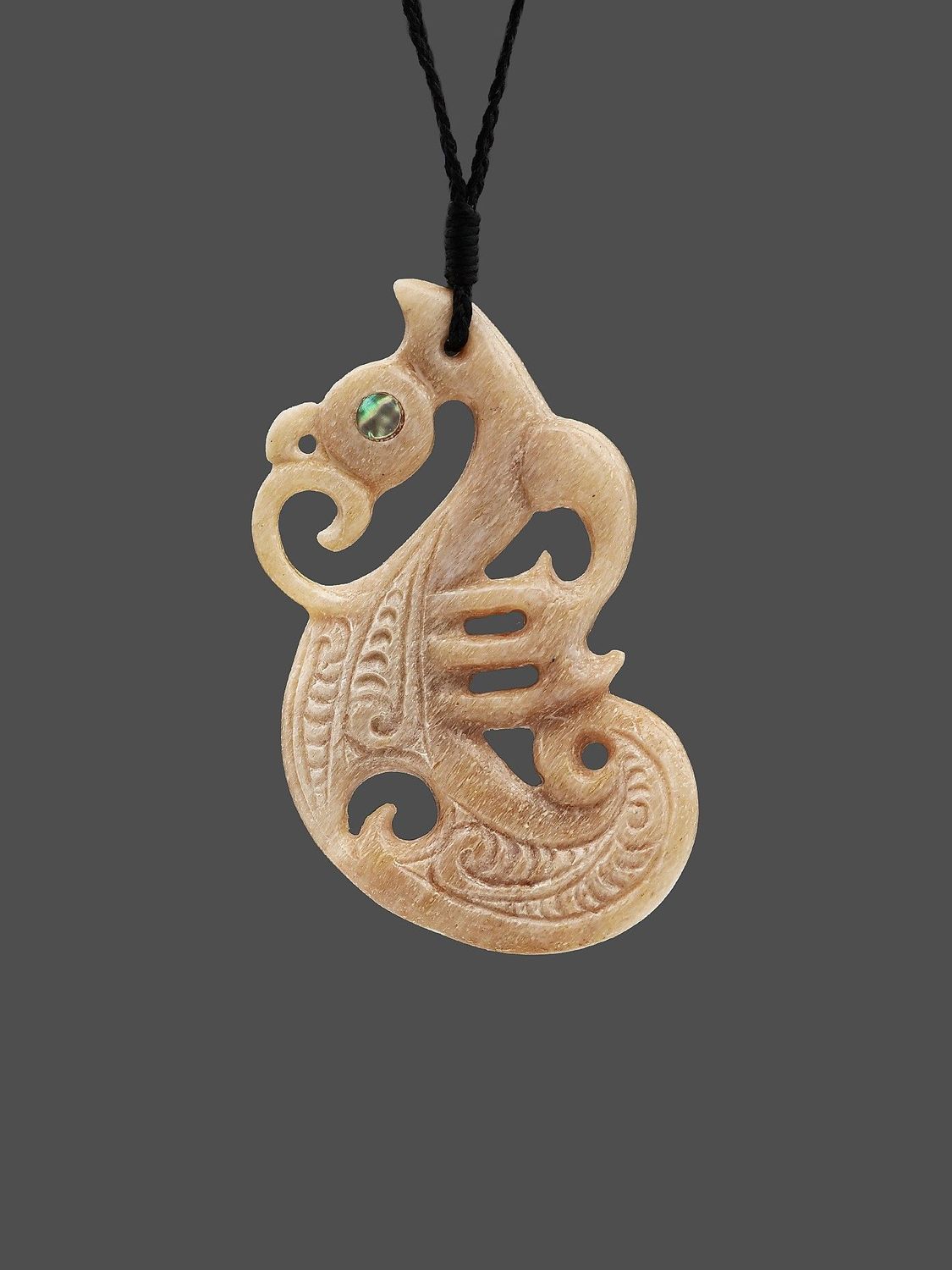 Moko Pounamu Manaia Genuine Whale Bone Carving - Awahohonu Moko Pounamu Manaia Genuine Whale Bone Carving - Awahohonu