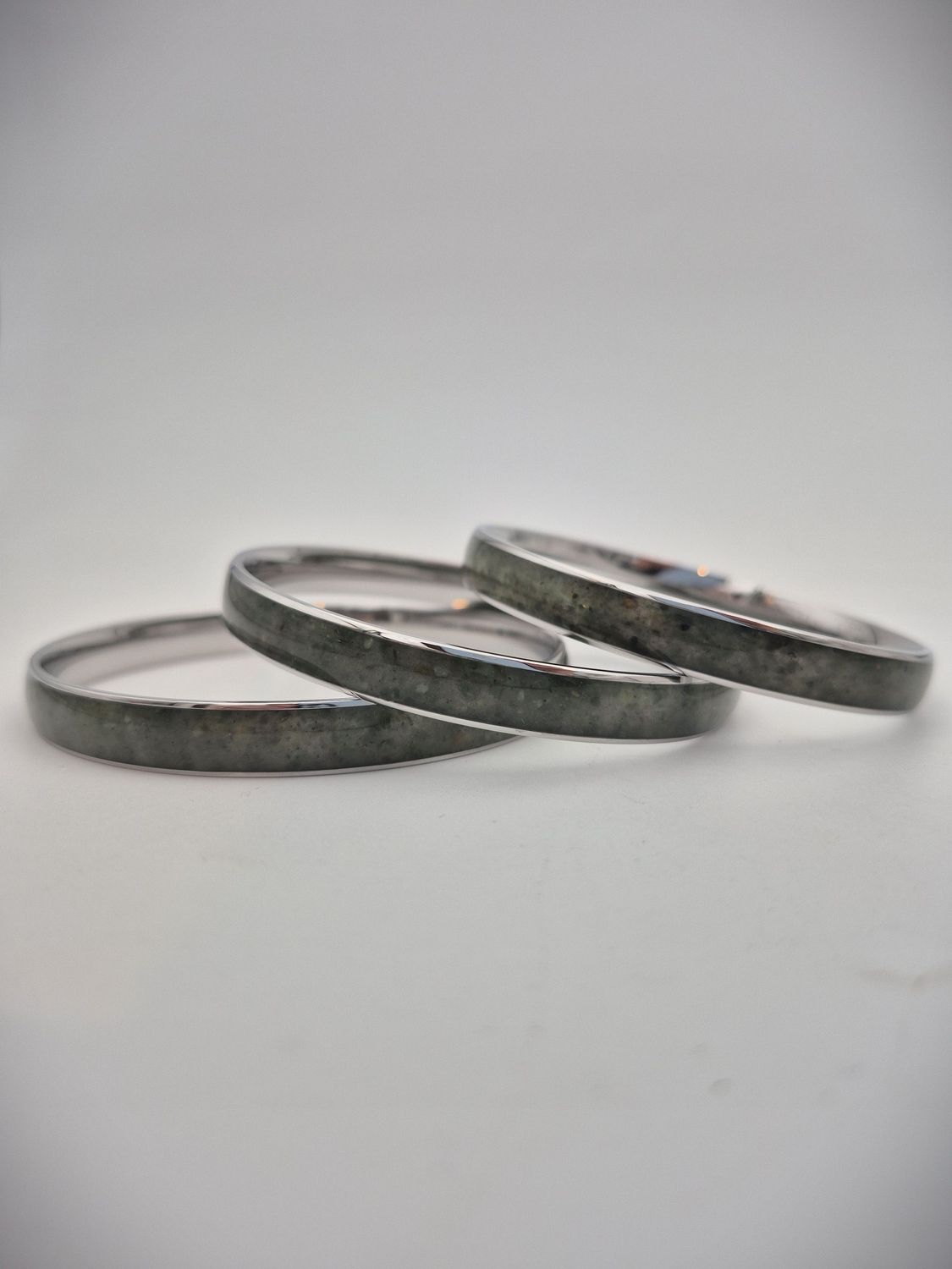 Moko Pounamu Stainless Steel and Kawakawa Pounamu Bangle 8mm Moko Pounamu Stainless Steel and Kawakawa Pounamu Bangle 8mm