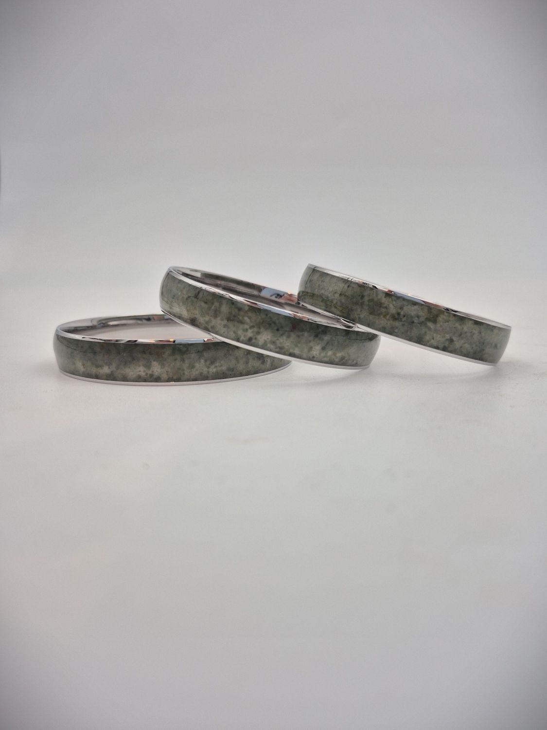 Moko Pounamu Stainless Steel and Kawakawa Pounamu Bangle 12mm Moko Pounamu Stainless Steel and Kawakawa Pounamu Bangle 12mm