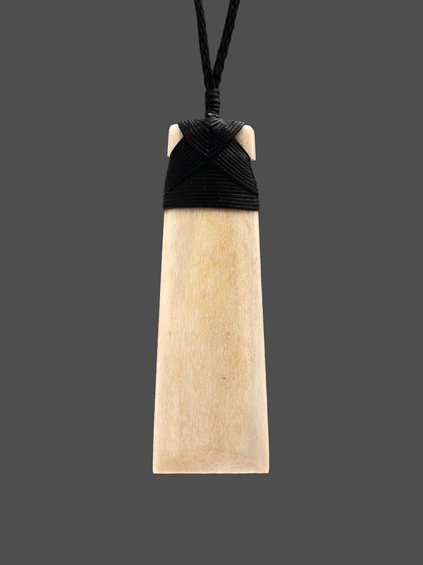 Moko Pounamu Toki Genuine Whale Bone Carving - Waihopo Moko Pounamu Toki Genuine Whale Bone Carving - Waihopo