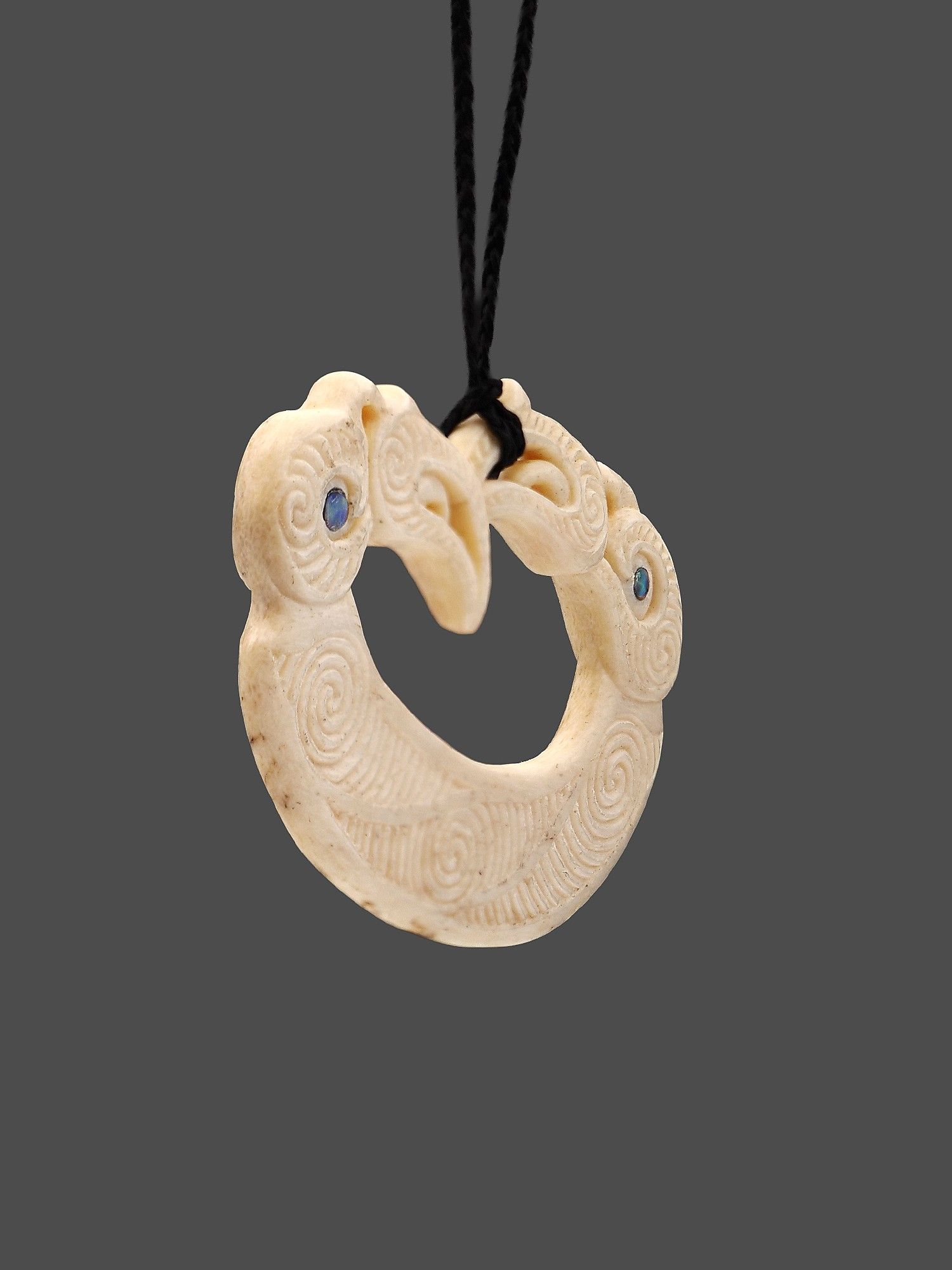 Moko Pounamu Double Manaia Genuine Whale Bone - Puketi